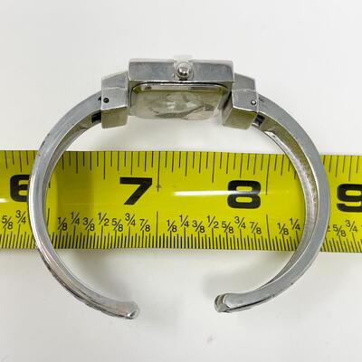 E-TIME SILVER TONED QUARTZ CUFF WATCH - WORKS