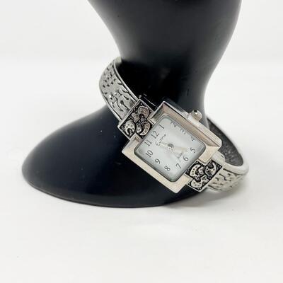 E-TIME SILVER TONED QUARTZ CUFF WATCH - WORKS
