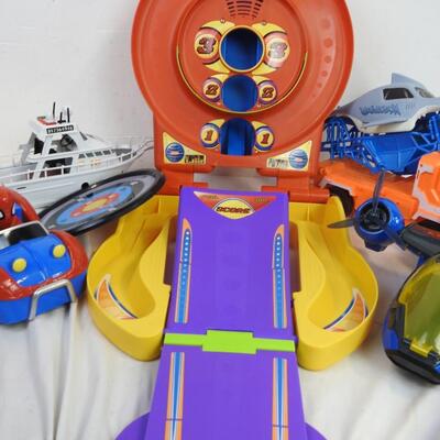 Toys 7 pc: Playskool Skeeball w/ launch pad & ramp, Spiderman w/ car, ferry boat