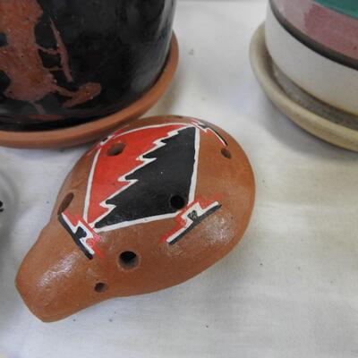 Native American style decor: Arrow heads , Ocarina, homemade clay pot