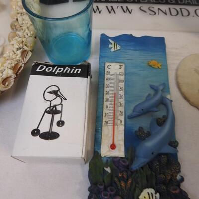 Beach decor: Sand dollar, Lighthouses,, seashell framed art, vases, thermometer
