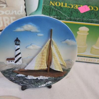 Beach decor: Sand dollar, Lighthouses,, seashell framed art, vases, thermometer
