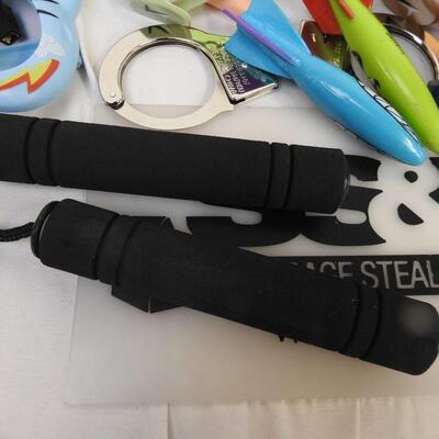 Toys: Nerf, guns, Numchucks, handcuffs, Viking helmet, Everlast boxing glove
