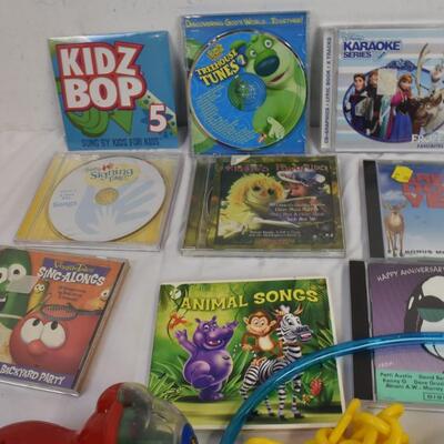 Kid Entertainment Lot: 9 CD Music Tracks, Toys, Minion Movie Hat, Basket