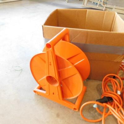 Collection of Outdoor Grade Extension Cords Various Lengths and Cord Reel