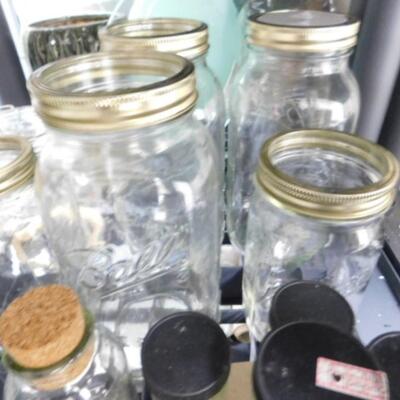 Collection of Jars of Various Sizes and Types