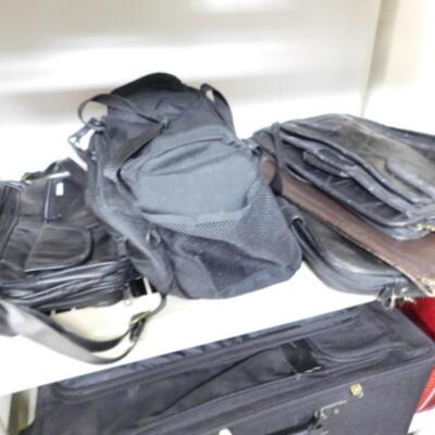 Several Pieces of Luggage and Carry Bags