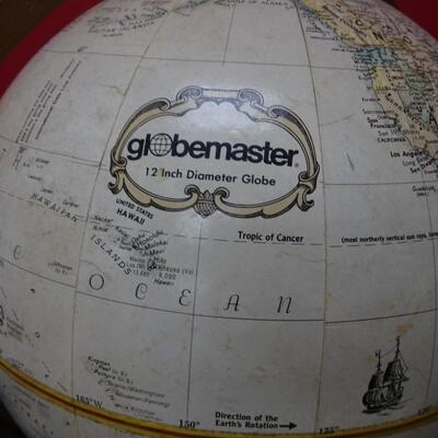 LOT 529. GLOBEMASTER 12 INCH GLOBE WITH WOOD BASE