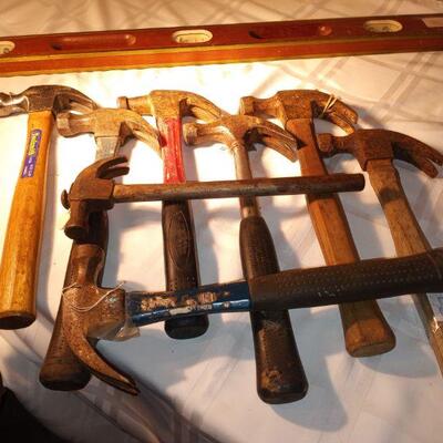 buckets of hammers and screw drivers