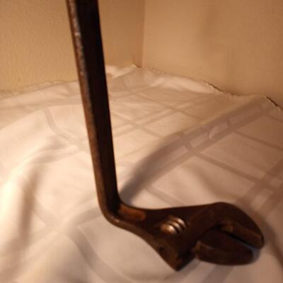 bent crescent wrench