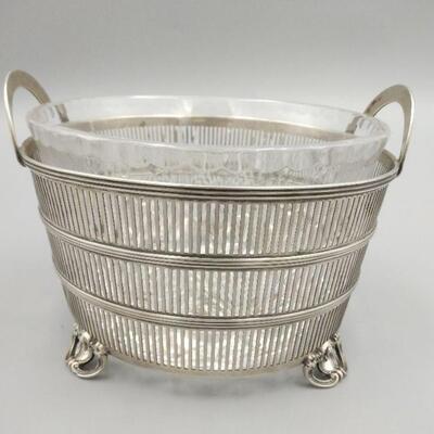 Nice glass bowl w/sterling basket base.
