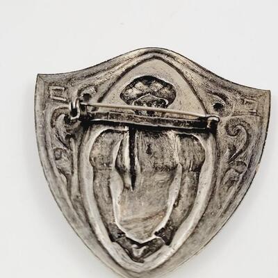 VINTAGE SILVER TONED CAMEO BROOCH