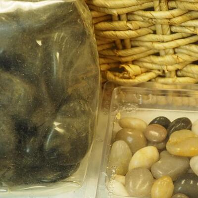 Lot 139- raffia basket, white and black stones, glass marbles, plates