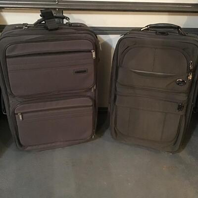 118 - 2 Tan Suitcases
