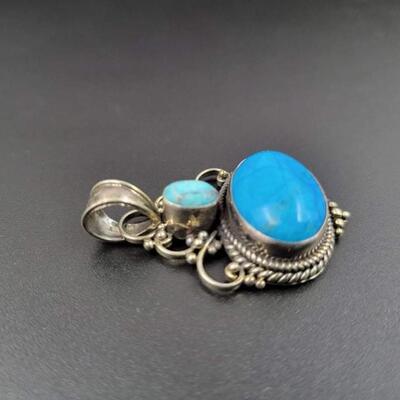 925 STERLING SILVER ORNATE PENDANT W/ BLUE STONE