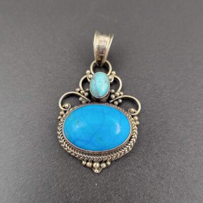 925 STERLING SILVER ORNATE PENDANT W/ BLUE STONE