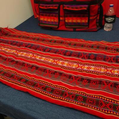 LOT 554. TABLE CLOTH AND DUFFLE BAG
