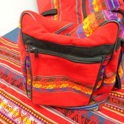 LOT 554. TABLE CLOTH AND DUFFLE BAG