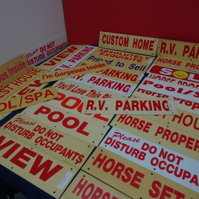 LOT 556. REAL ESTATE DESCRIPTION SIGNS