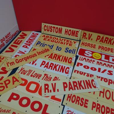 LOT 556. REAL ESTATE DESCRIPTION SIGNS