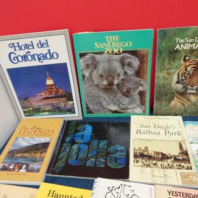 LOT 557. COLLECTION OF SAN DIEGO RELATED BOOKS AND CALENDAR