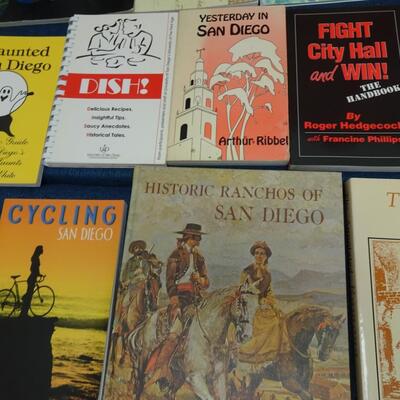 LOT 557. COLLECTION OF SAN DIEGO RELATED BOOKS AND CALENDAR