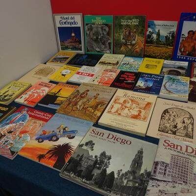 LOT 557. COLLECTION OF SAN DIEGO RELATED BOOKS AND CALENDAR