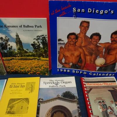 LOT 557. COLLECTION OF SAN DIEGO RELATED BOOKS AND CALENDAR