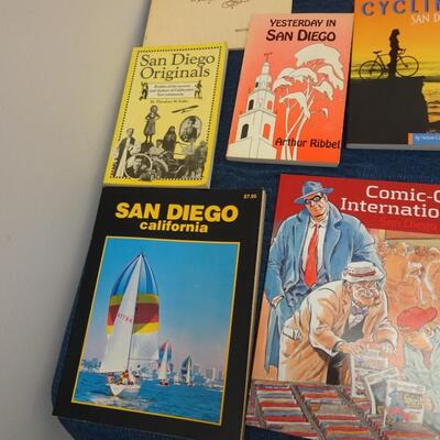 LOT 557. COLLECTION OF SAN DIEGO RELATED BOOKS AND CALENDAR