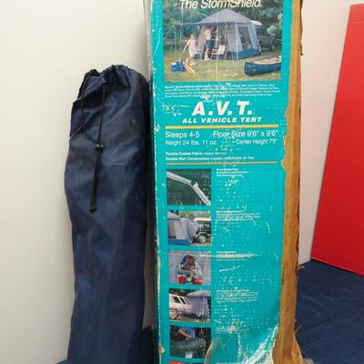LOT 560 EUREKA STORM SHIELD SUV TENT