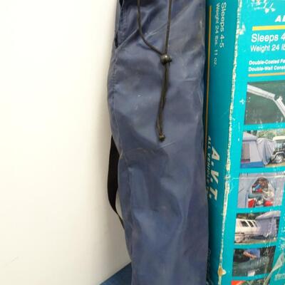 LOT 560 EUREKA STORM SHIELD SUV TENT