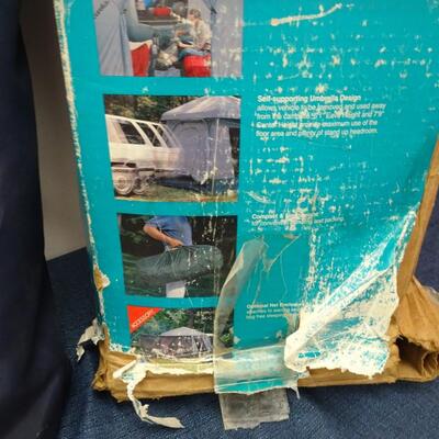 LOT 560 EUREKA STORM SHIELD SUV TENT