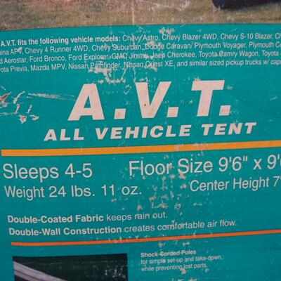 LOT 560 EUREKA STORM SHIELD SUV TENT