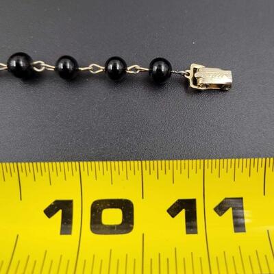 BLACK AND GOLD BEADED FLOWER BRACELET