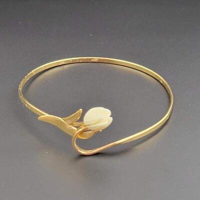 AVON TULIP GOLD TONED BANGLE BRACELET
