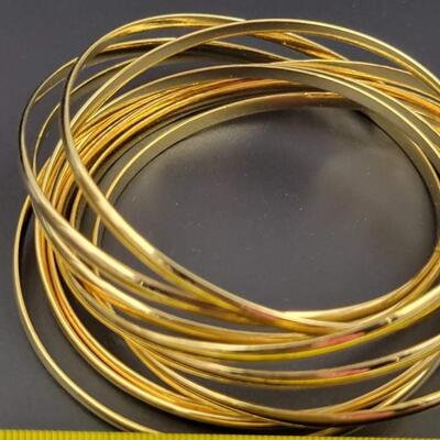 GOLD TONED INTERLOCKING BANGLE BRACELET