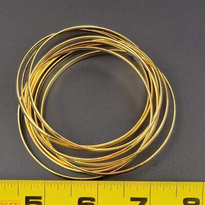 GOLD TONED INTERLOCKING BANGLE BRACELET