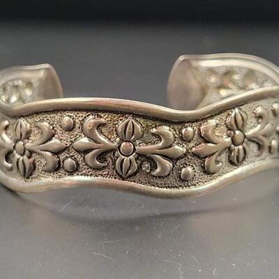 SILVER TONED METAL CUFF BRACELET