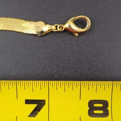 GOLD TONED OMEGA BRACELET