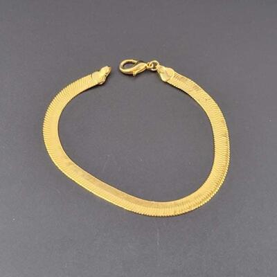 GOLD TONED OMEGA BRACELET