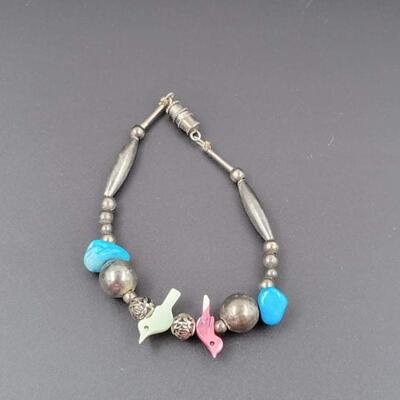 SILVER METAL BRACELET W/ BIRDS & BLUE STONES