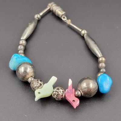 SILVER METAL BRACELET W/ BIRDS & BLUE STONES