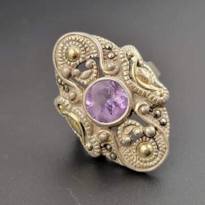 STERLING SILVER RING W/ PURPLE GEMSTONE