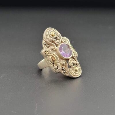 STERLING SILVER RING W/ PURPLE GEMSTONE