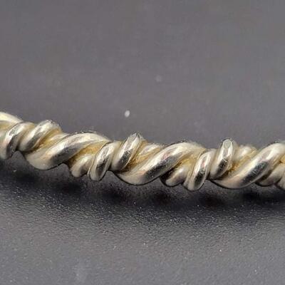 SILVER METAL TWISTED BANGLE