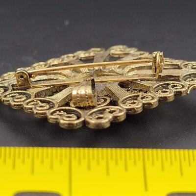 GOLD TONED FILIGREE CAMEO BROOCH