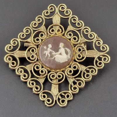 GOLD TONED FILIGREE CAMEO BROOCH