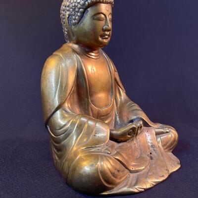 A small cast Gilt Bronze Seated Shakyamuni Buddha