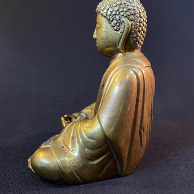 A small cast Gilt Bronze Seated Shakyamuni Buddha