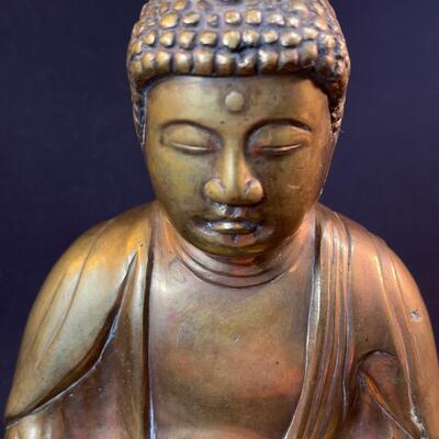 A small cast Gilt Bronze Seated Shakyamuni Buddha